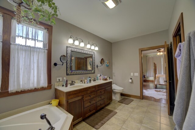 1897 N 2500 E Rd, Watseka, IL 60970 - bathroom with double vanity, a garden tub, tile patterned floors, and connected bathroom