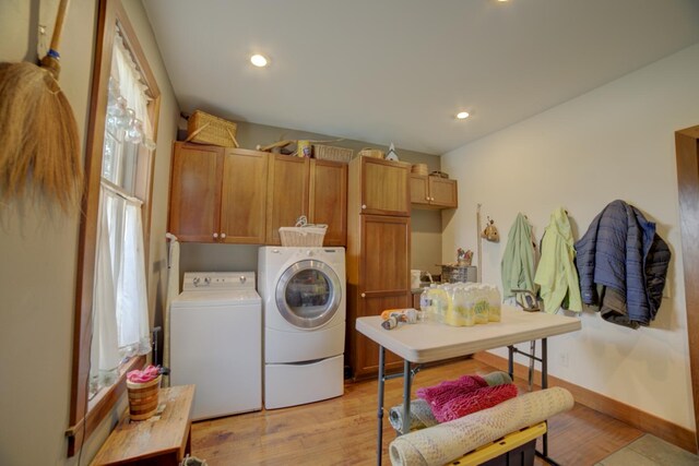 1897 N 2500 E Rd, Watseka, IL 60970 - laundry area featuring washer and dryer, cabinet space, light wood-style flooring, and recessed lighting