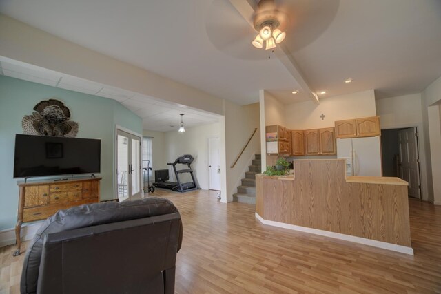1897 N 2500 E Rd, Watseka, IL 60970 - living area featuring french doors, light wood finished floors, stairs, ceiling fan, and recessed lighting