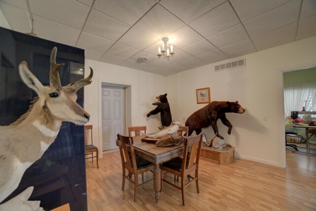 1897 N 2500 E Rd, Watseka, IL 60970 - dining room with light wood-style floors, a chandelier, and a drop ceiling