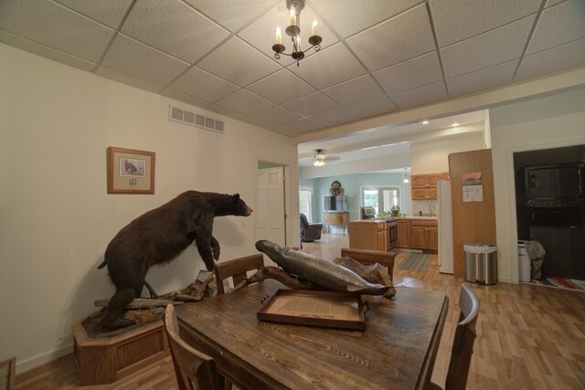 1897 N 2500 E Rd, Watseka, IL 60970 - dining room featuring light wood-type flooring, a drop ceiling, and ceiling fan
