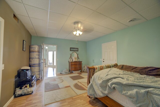 1897 N 2500 E Rd, Watseka, IL 60970 - bedroom with a drop ceiling, wood finished floors, and a ceiling fan