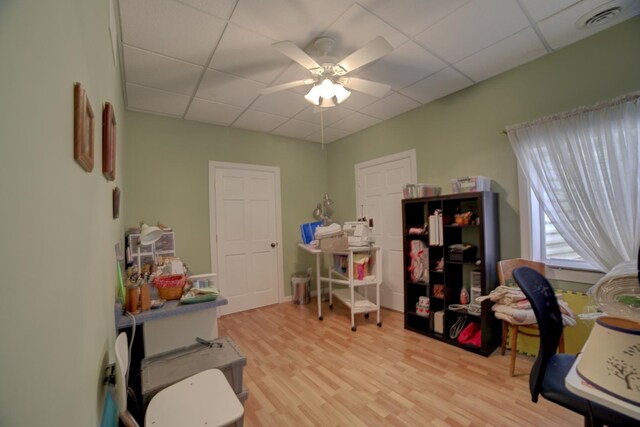 1897 N 2500 E Rd, Watseka, IL 60970 - home office featuring ceiling fan, a drop ceiling, and light wood-type flooring