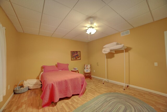 1897 N 2500 E Rd, Watseka, IL 60970 - bedroom featuring wood finished floors and a drop ceiling
