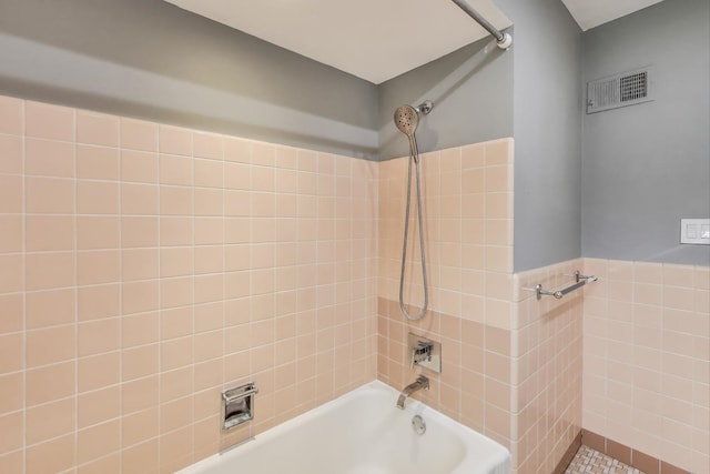 433 S Dunton Ave, Arlington Heights, IL 60005 - bathroom with tub / shower combination and tile walls