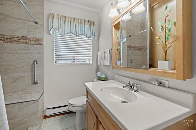 417 Berkshire Dr Unit 16, Crystal Lake, IL 60014 - full bathroom with a baseboard heating unit, a shower stall, vanity, and toilet