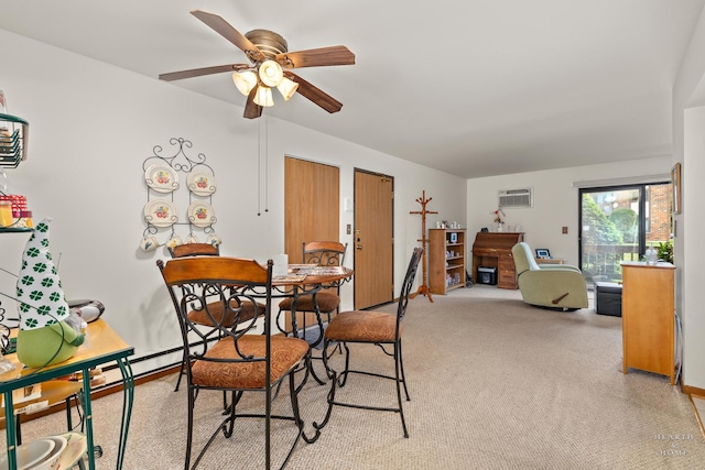 417 Berkshire Dr Unit 16, Crystal Lake, IL 60014 - dining area featuring light colored carpet, ceiling fan, a wall unit AC, and a fireplace