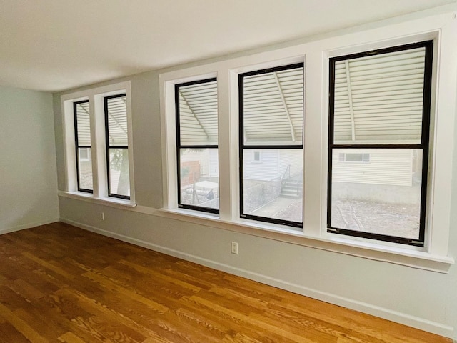 3106 S May St, Chicago, IL 60608 - empty room with wood finished floors and baseboards