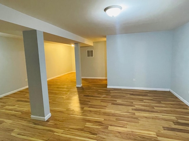 3106 S May St, Chicago, IL 60608 - finished below grade area with wood finished floors and baseboards