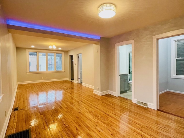 3106 S May St, Chicago, IL 60608 - unfurnished room featuring wood finished floors and baseboards