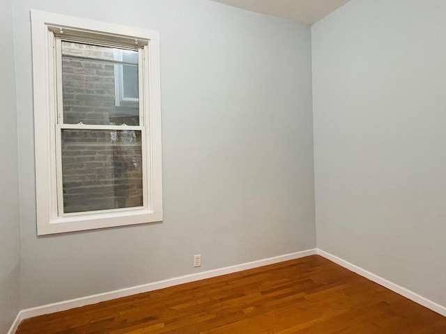 3106 S May St, Chicago, IL 60608 - spare room featuring baseboards and wood finished floors