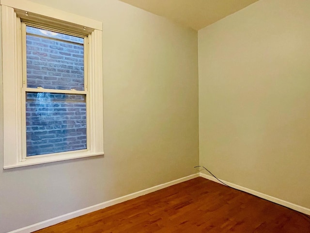 3106 S May St, Chicago, IL 60608 - empty room with baseboards and wood finished floors