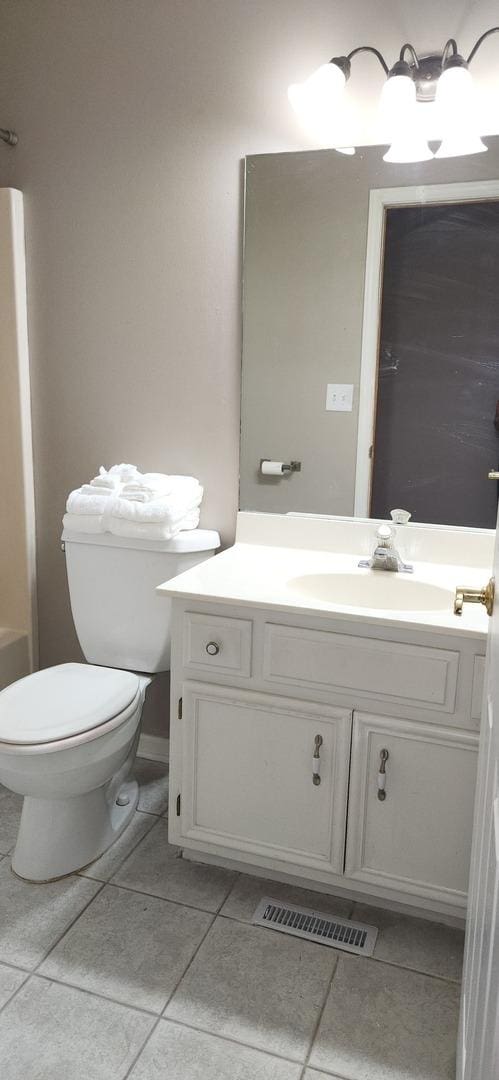 23243 S Volbrecht Rd, Crete, IL 60417 - bathroom featuring tile patterned floors, vanity, and toilet