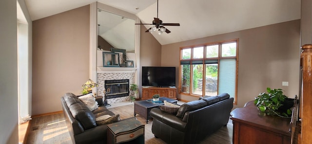 23243 S Volbrecht Rd, Crete, IL 60417 - living room featuring ceiling fan, a fireplace, vaulted ceiling, wood finished floors, and baseboards