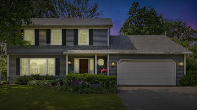 533 Warwick Dr, Naperville, IL 60565 - view of front of property featuring asphalt driveway, a garage, a front lawn, and roof with shingles