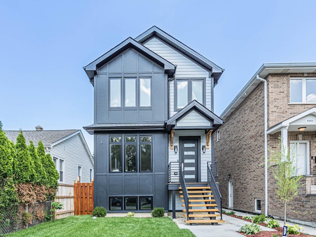 4845 N Mcvicker Ave, Chicago, IL 60630 - view of front of house featuring board and batten siding