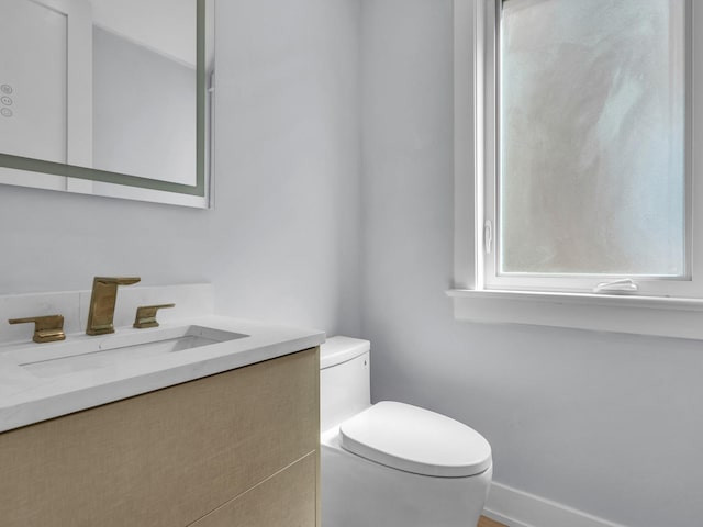 4845 N Mcvicker Ave, Chicago, IL 60630 - bathroom featuring toilet and vanity