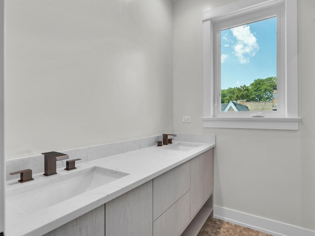 4845 N Mcvicker Ave, Chicago, IL 60630 - full bath featuring double vanity and plenty of natural light