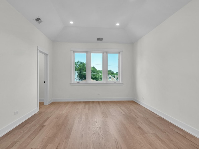 4845 N Mcvicker Ave, Chicago, IL 60630 - unfurnished room featuring light wood-type flooring, vaulted ceiling, and recessed lighting