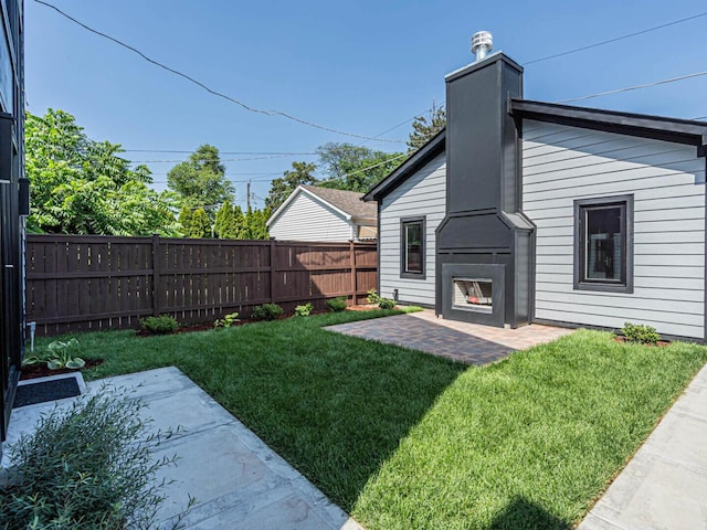 4845 N Mcvicker Ave, Chicago, IL 60630 - fenced backyard with a patio