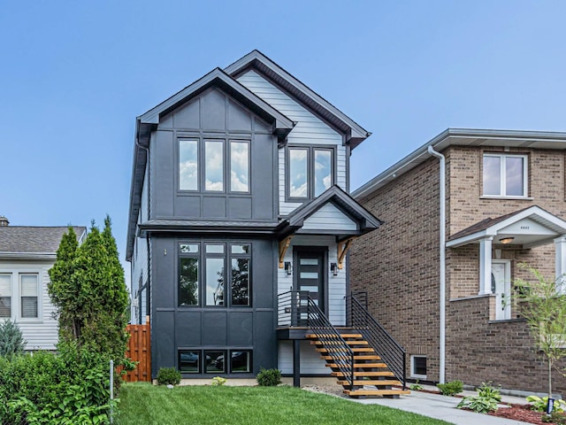 4845 N Mcvicker Ave, Chicago, IL 60630 - view of front of property featuring board and batten siding