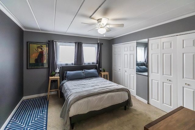320 Circle Ave Unit 102, Forest Park, IL 60130 - carpeted bedroom with crown molding, multiple closets, and ceiling fan