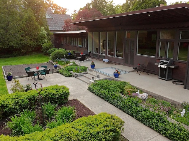 811 Redwood Ln, Glenview, IL 60025 - view of patio with a grill and outdoor dining area
