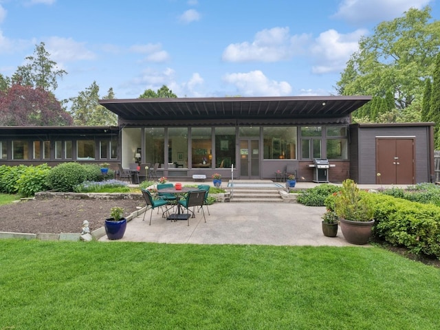 811 Redwood Ln, Glenview, IL 60025 - rear view of property with a patio and a yard