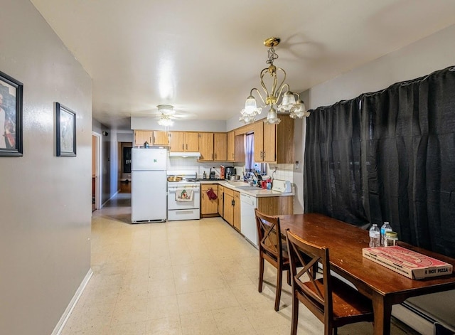1619 N 35th Ave, Melrose Park, IL 60160 - kitchen featuring white appliances, a sink, light countertops, baseboards, and a baseboard radiator