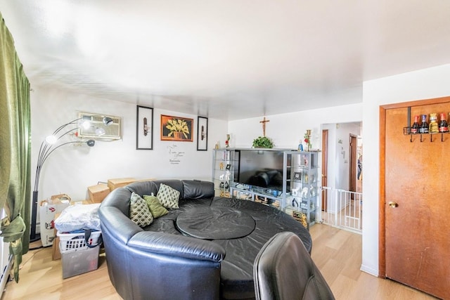 1619 N 35th Ave, Melrose Park, IL 60160 - living area featuring wood finished floors and a wall mounted AC