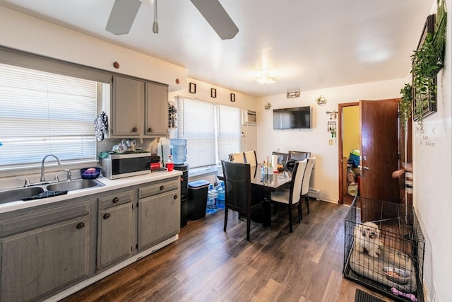 1619 N 35th Ave, Melrose Park, IL 60160 - dining space featuring a ceiling fan and dark wood-style flooring