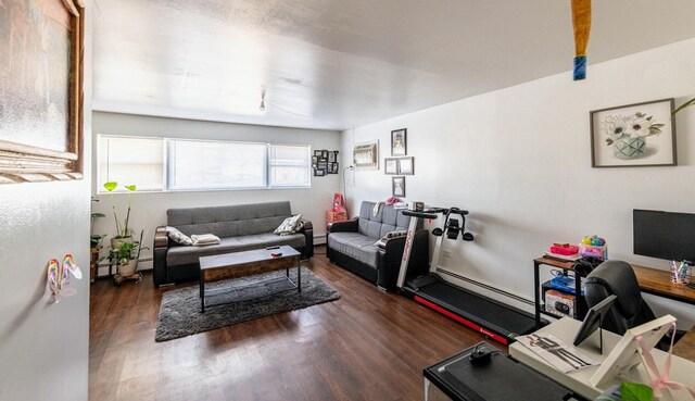1619 N 35th Ave, Melrose Park, IL 60160 - living area with a baseboard radiator, wood finished floors, and a desk