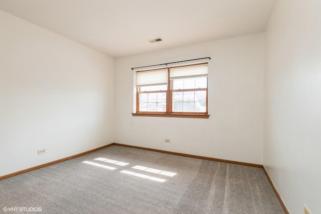 1141 Greenwood Cir Unit 7F, Woodstock, IL 60098 - carpeted empty room featuring baseboards
