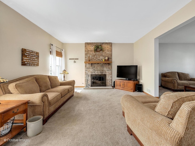 1665 Whispering Oaks Ct, West Chicago, IL 60185 - living room with a brick fireplace and carpet
