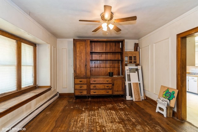 428 Hull Ct, Waukegan, IL 60085 - living room with a baseboard radiator, dark wood finished floors, ceiling fan, crown molding, and baseboards