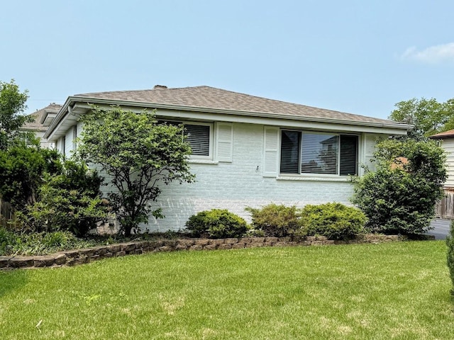 572 N Emroy Ave, Elmhurst, IL 60126 - view of home's exterior featuring a yard and brick siding