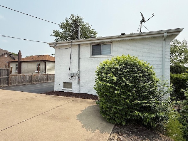 572 N Emroy Ave, Elmhurst, IL 60126 - view of side of home with brick siding and a patio area