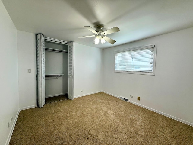 572 N Emroy Ave, Elmhurst, IL 60126 - unfurnished bedroom featuring carpet flooring, a closet, and ceiling fan