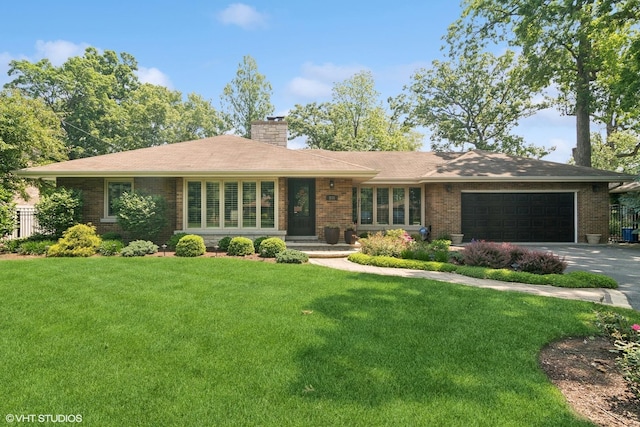 231 N Forest Ct, Addison, IL 60101 - ranch-style house with driveway, brick siding, an attached garage, and a front yard