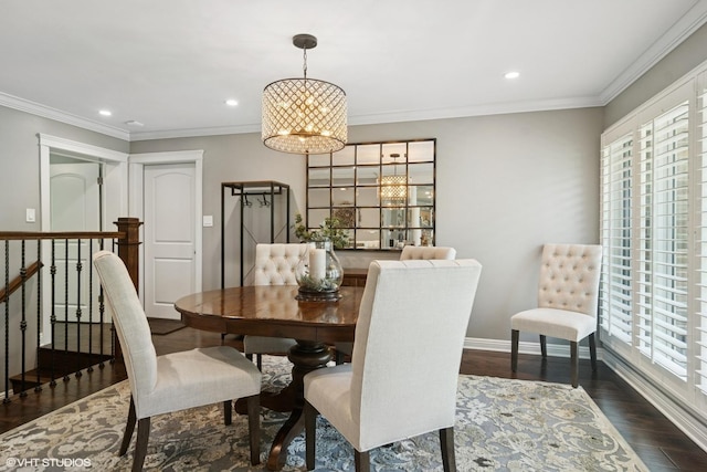 231 N Forest Ct, Addison, IL 60101 - dining area with plenty of natural light, dark wood-type flooring, a chandelier, ornamental molding, and baseboards