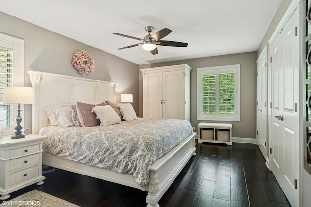 231 N Forest Ct, Addison, IL 60101 - bedroom with dark wood-style flooring, baseboards, and a ceiling fan
