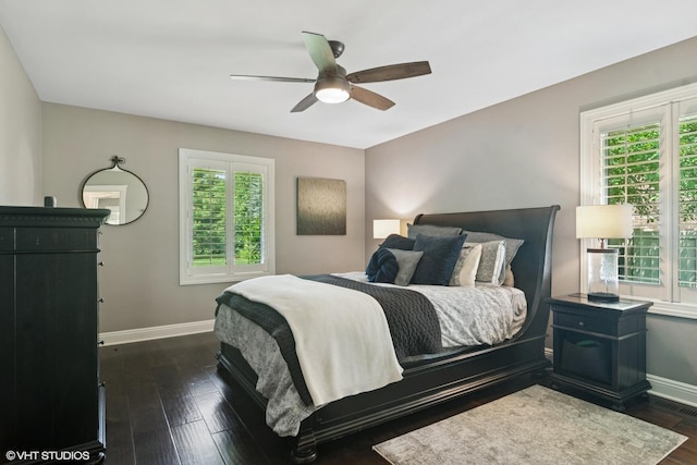 231 N Forest Ct, Addison, IL 60101 - bedroom featuring multiple windows, baseboards, and dark wood-type flooring