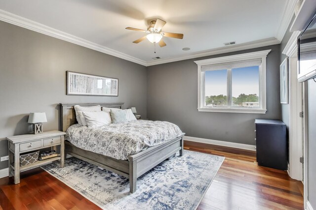 2709 W Bryn Mawr Ave Unit 4, Chicago, IL 60659 - bedroom with baseboards, multiple windows, ornamental molding, wood finished floors, and ceiling fan
