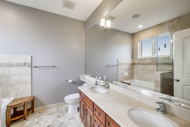 2709 W Bryn Mawr Ave Unit 4, Chicago, IL 60659 - full bathroom featuring a bath, double vanity, baseboards, toilet, and a shower stall