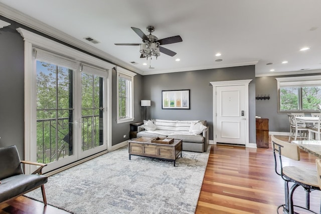 2709 W Bryn Mawr Ave Unit 4, Chicago, IL 60659 - living room featuring crown molding, ceiling fan, wood finished floors, baseboards, and recessed lighting