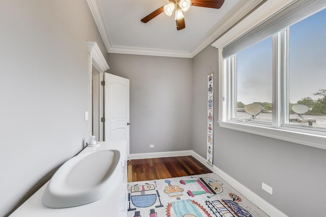 2709 W Bryn Mawr Ave Unit 4, Chicago, IL 60659 - bathroom featuring ornamental molding, healthy amount of natural light, ceiling fan, baseboards, and wood finished floors