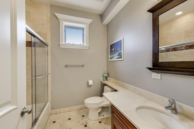 2709 W Bryn Mawr Ave Unit 4, Chicago, IL 60659 - bathroom featuring vanity, toilet, tile patterned flooring, baseboards, and enclosed tub / shower combo