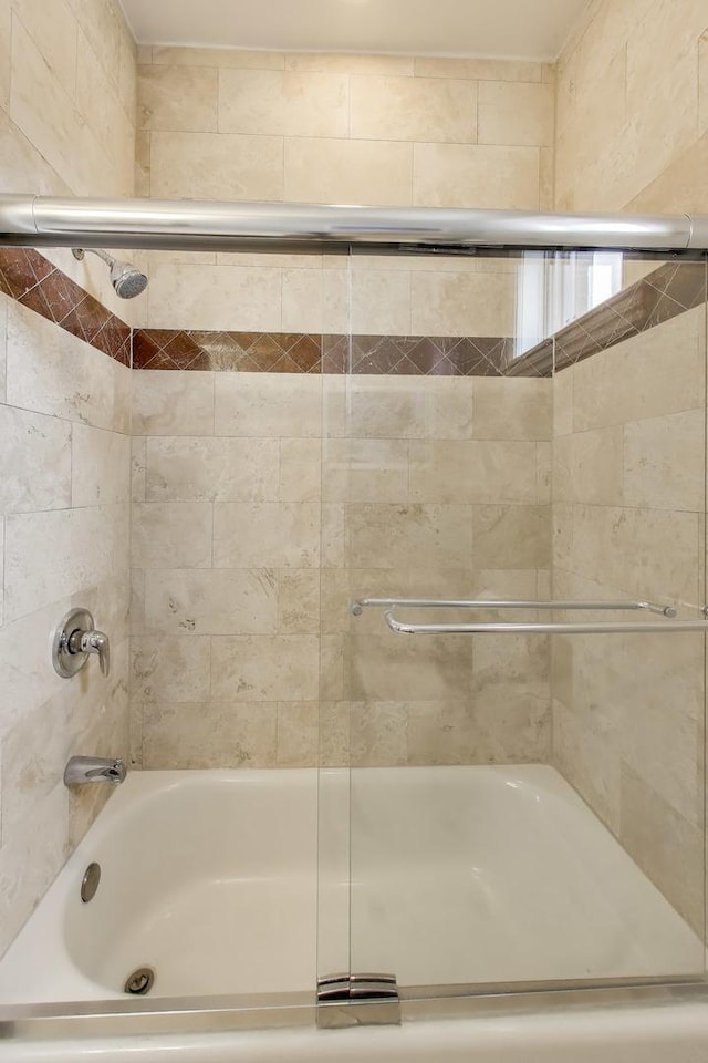 2709 W Bryn Mawr Ave Unit 4, Chicago, IL 60659 - bathroom with bath / shower combo with glass door