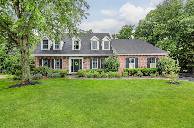 1925 Kentwood Ct, Darien, IL 60561 - new england style home with brick siding, a front yard, and roof with shingles