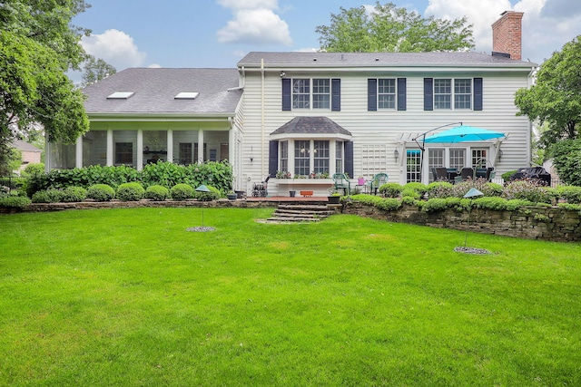 1925 Kentwood Ct, Darien, IL 60561 - rear view of house featuring a chimney, a lawn, a sunroom, and roof with shingles
